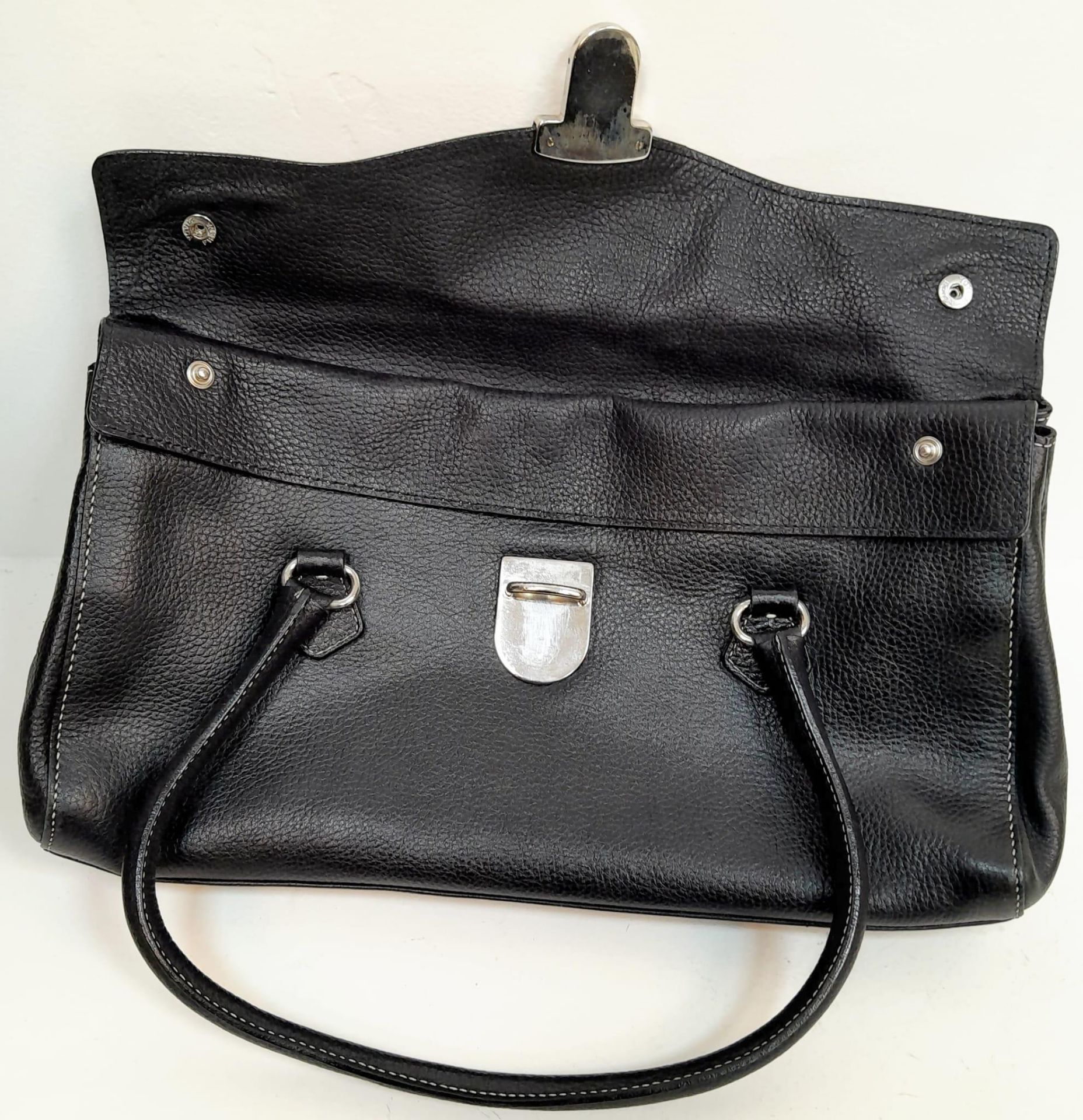 A Prada Black Shoulder Bag. Leather exterior with silver-toned hardware, two rolled leather - Bild 5 aus 7