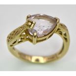 A9K GOLD SERPENT SHAPED RING WITH LARGE AMETHYST STONE . 3.7gms size O