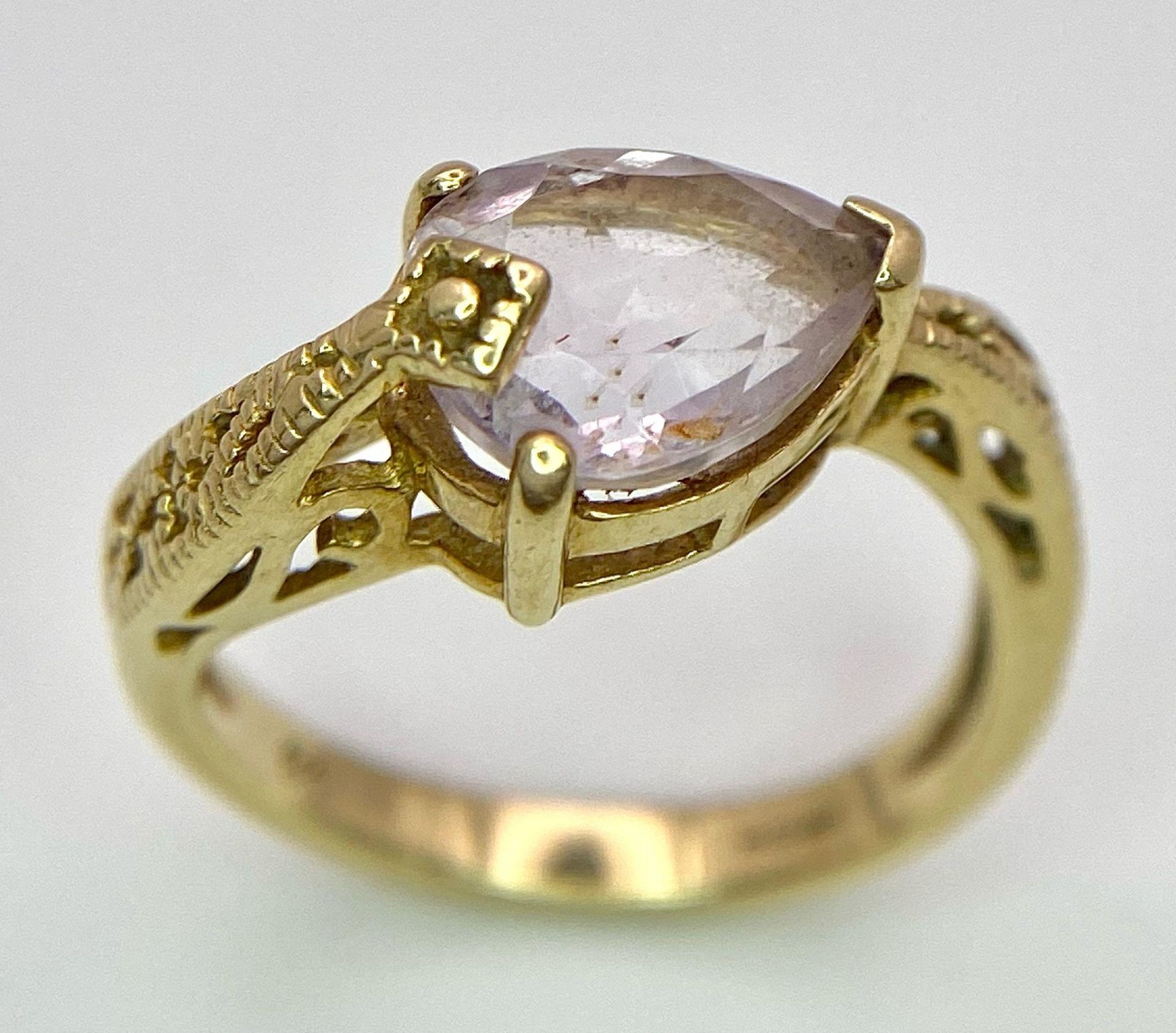 A9K GOLD SERPENT SHAPED RING WITH LARGE AMETHYST STONE . 3.7gms size O