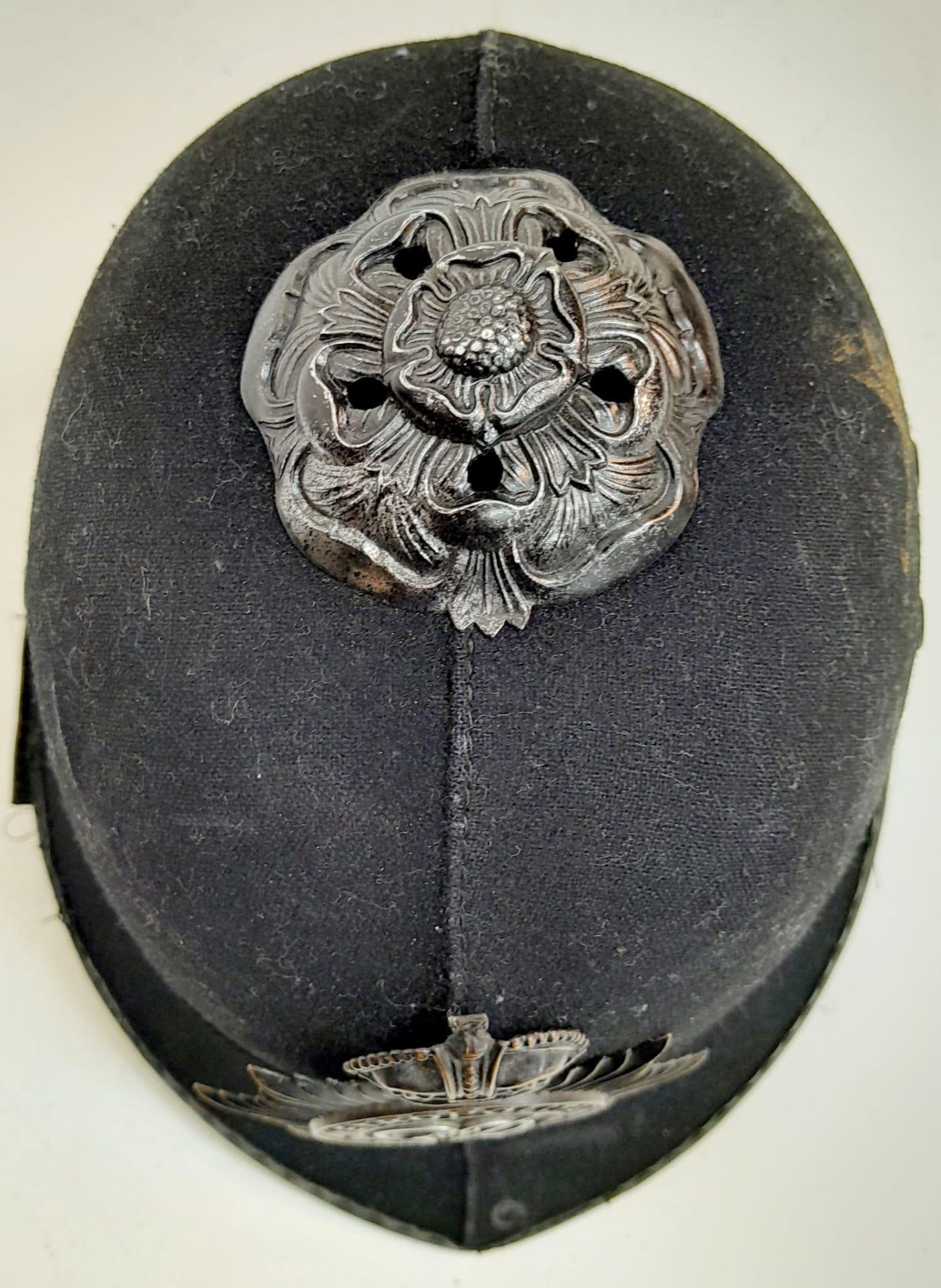 A British Metropolitan Police Helmet. Complete with original badge. - Image 3 of 5