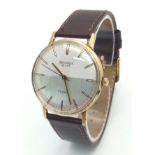 A Vintage Sekonda De Luxe 23 Jewels Gents Watch. Brown leather strap. Gilded stainless steel