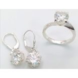 A White Moissanite Ring with a Matching Pair of Moissanite Earrings. 7ctw of moissanite. Ring size