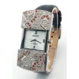 An Ingersoll Hidden Quartz Ladies Watch. Black leather strap. Rectangular hidden case - 27mm. Silver