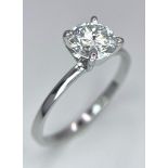 A 14 K white gold solitaire ring with a round cut, moissanite (1 carat), ring size: N, weight: 1.7