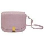 A Paul & Joe Lilac Saddle Bag. Leather exterior with adjustable strap, open compartment on back, and