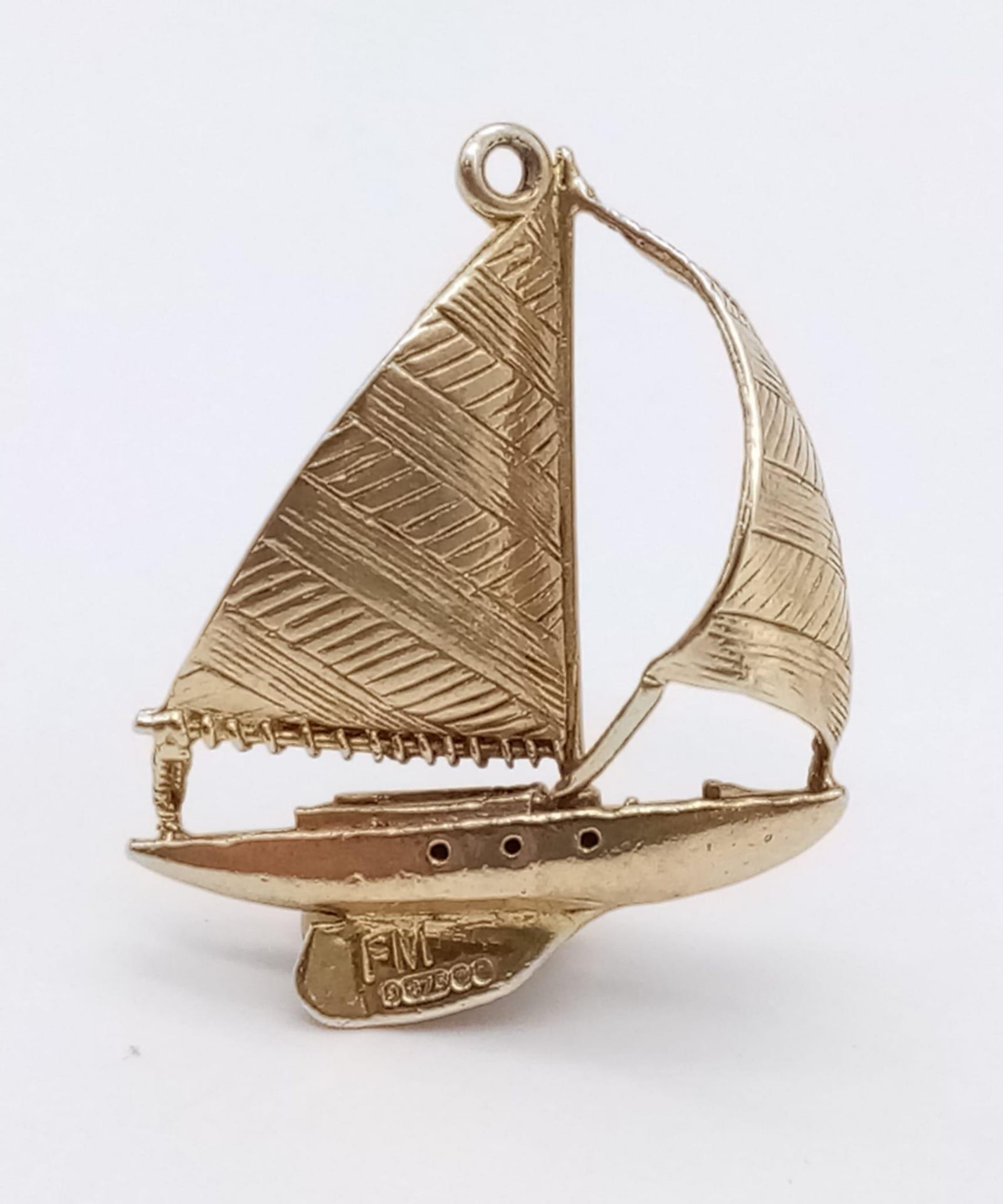 A 9K Yellow Gold Sailboat Pendant/Charm. 2cm x 2cm. 3.42g