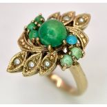 A VINTAGE 9K GOLD RING DECORATED WITH TUQUOISE AND SEED PEARLS 5gms size L