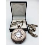 A Vintage Sterling Silver Half Hunter 'Record' Pocket Watch. Comes with an antique Albert chain