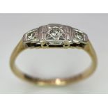 An ART DECO 9 K yellow gold and platinum ring with a trilogy of round cut diamonds. Size: L, weight: