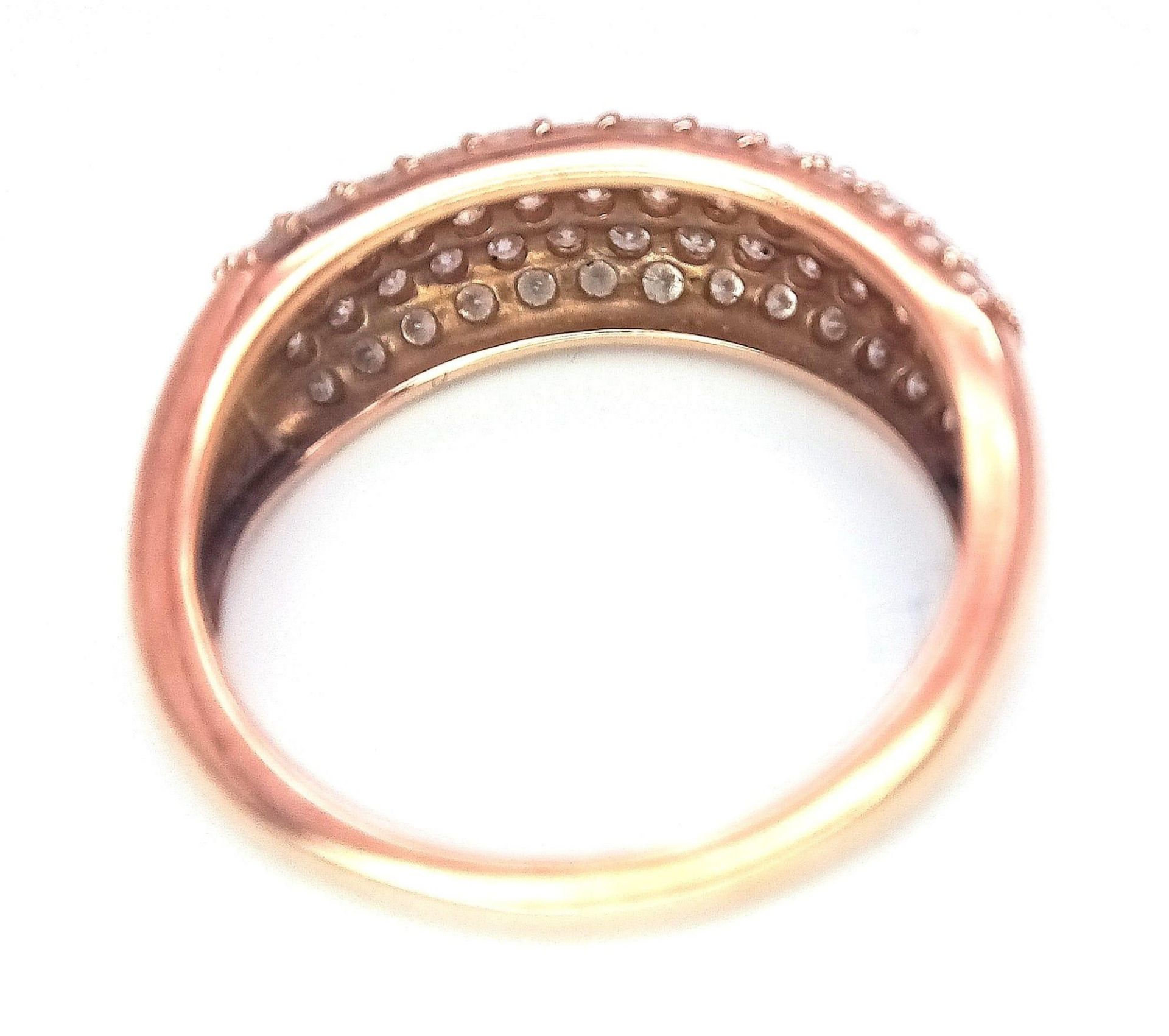 A 9K Rose Gold Diamond Encrusted Ring. Five rows of 70 small cut round diamonds. Size N. 3.2g - Bild 4 aus 6