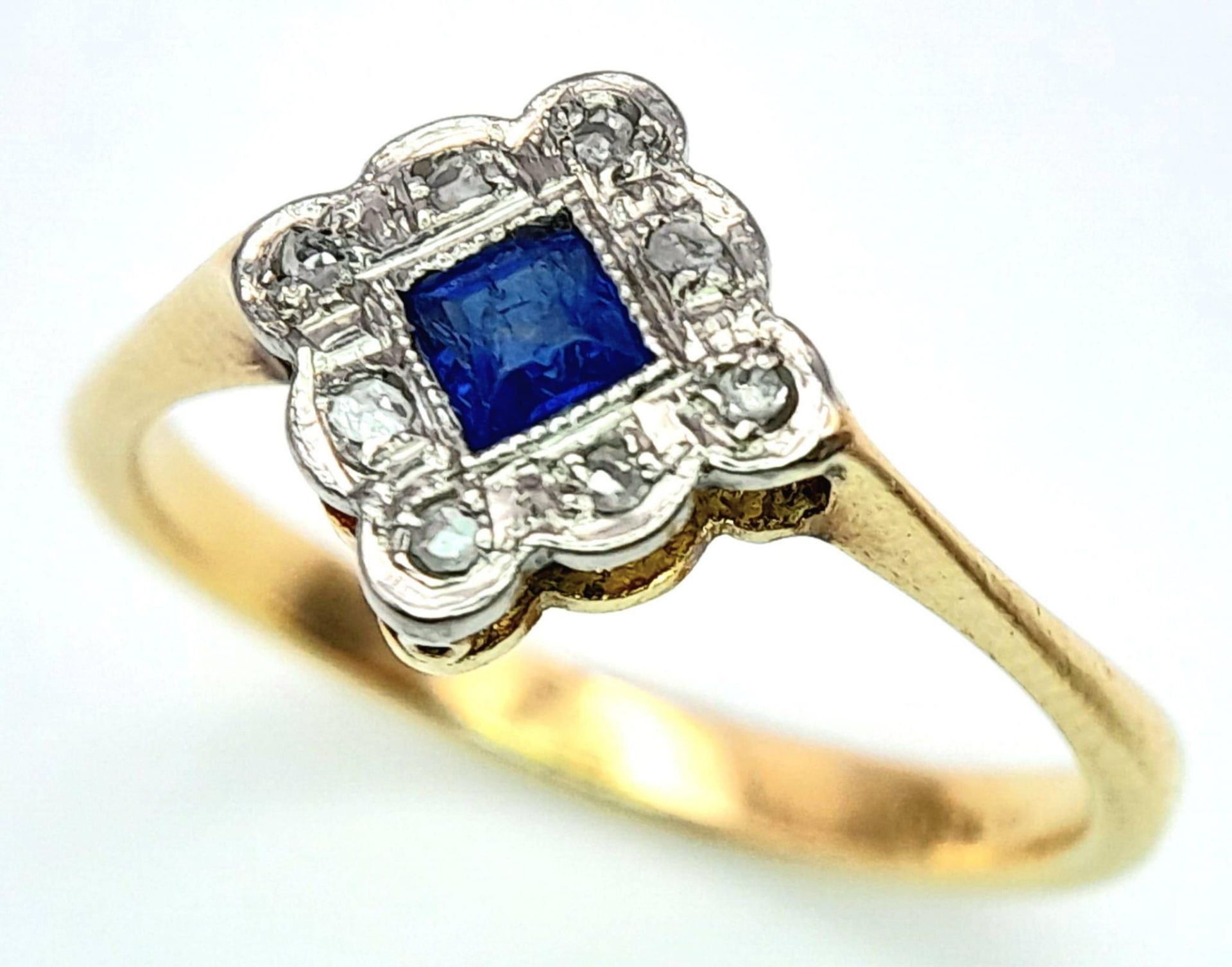 A VINTAGE 18K YELLOW GOLD, PLATINUM DIAMOND & SAPPHIRE RING. 3G. SIZE O.