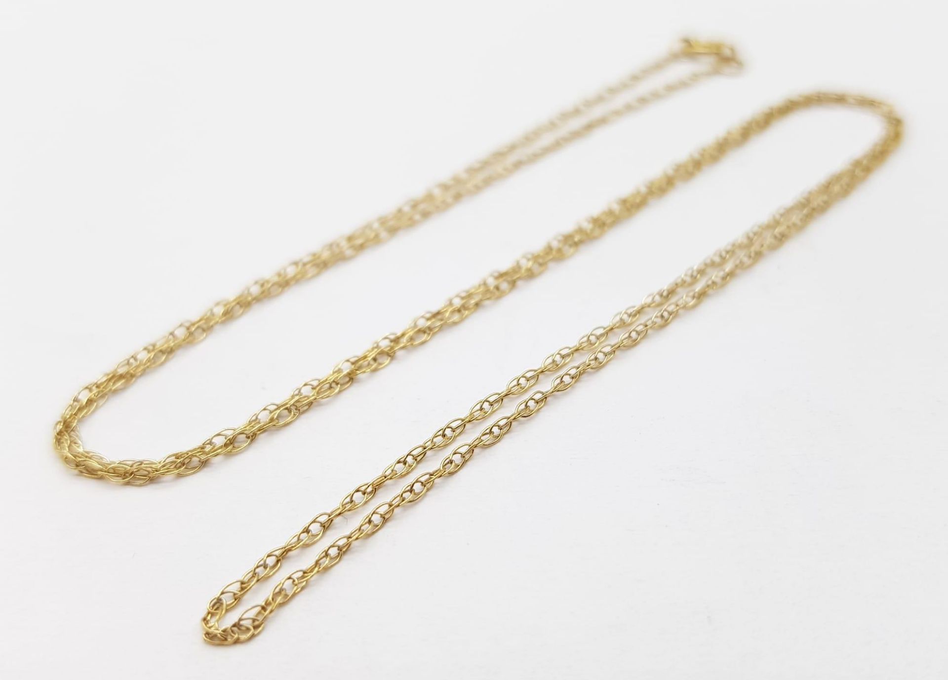 A 9K Yellow Gold Disappearing Necklace. 44cm. 0.8g