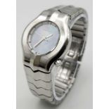 A Tag Heuer Alter Ego Quartz Ladies Watch. Stainless steel bracelet and case - 29mm. Mother of pearl