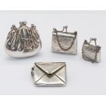 Four Sterling Silver Handbag Shaped Pendants. 40g total weight.