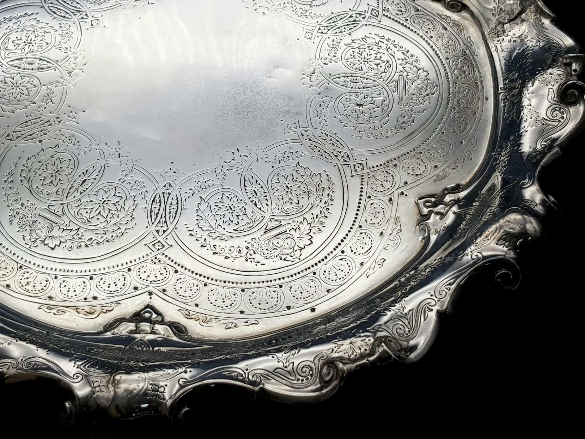 A 761gms solid silver Salva with scrolled edges and hand chased intricate decoration and - Image 3 of 7