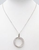 A fancy 925 silver double Zirconia cluster circle pendant on silver belcher chain. Total weight 4.
