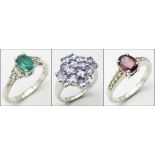 Three 925 Sterling Silver Gemstone Rings: Garnet - Size R, Amethyst - Size P and Emerald - Size P.