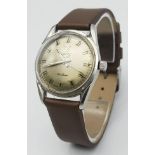 A Vintage Camy 17 Jewel Deluxe Mechanical Gents Watch. Brown leather strap. Stainless steel case -