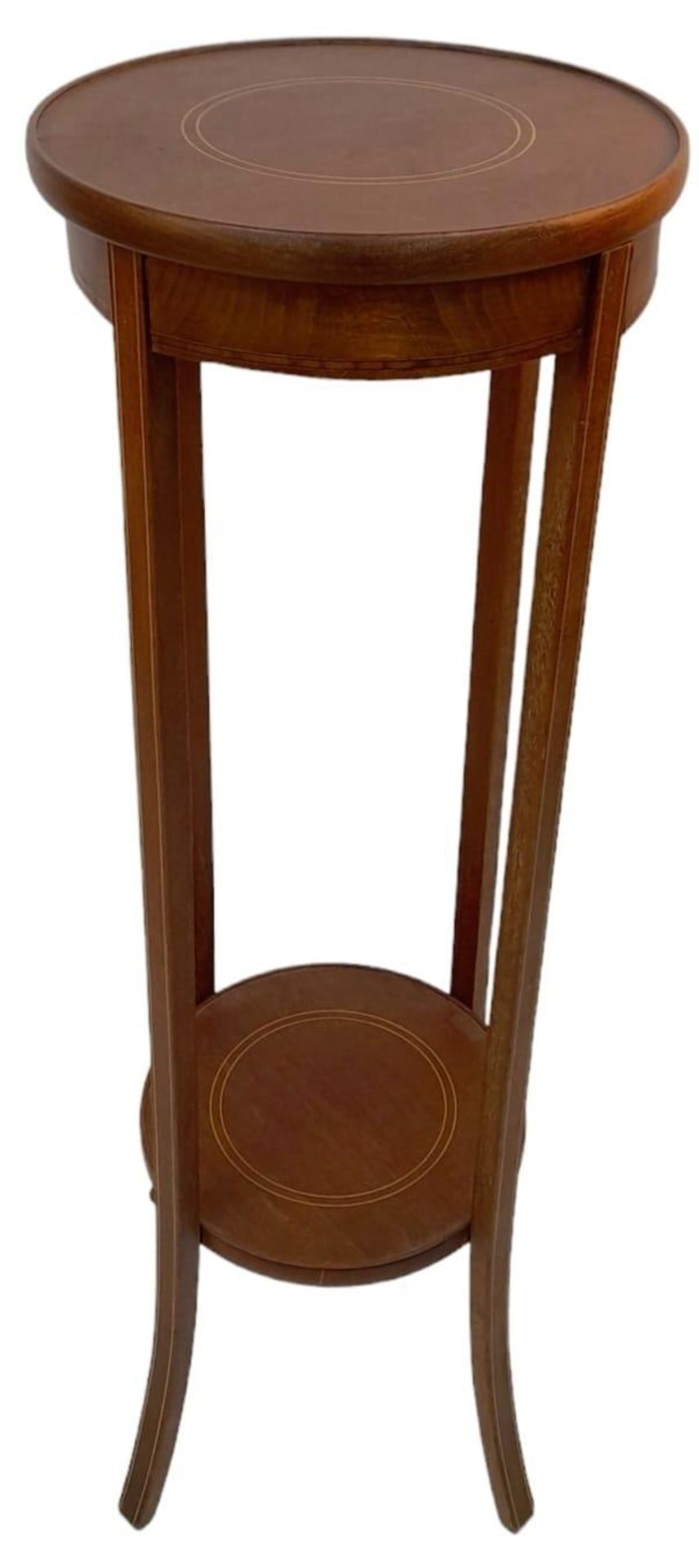 An Antique Edwardian Mahogany Plant Stand. 98cm tall. 32cm diameter at top. Winning bidder picks