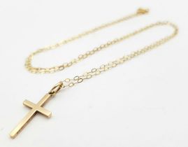 9k yellow gold cross pendant on 16" belcher chain, total weight 0.9g