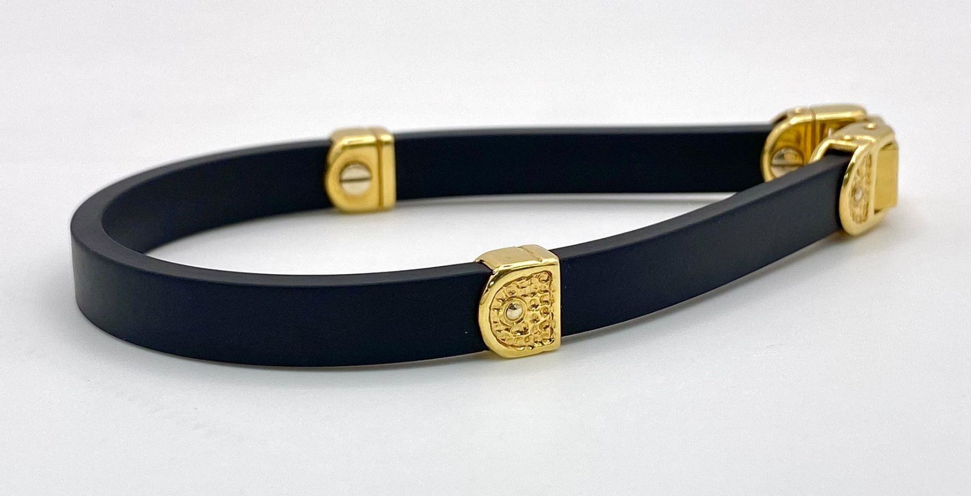 A Bersani Designer Black Silicone and 18K Yellow Gold Stylish Comfort Bracelet.