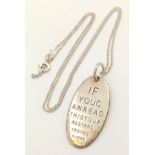 A vintage 925 silver pendant with engraving messages " If you can read this you are standing too