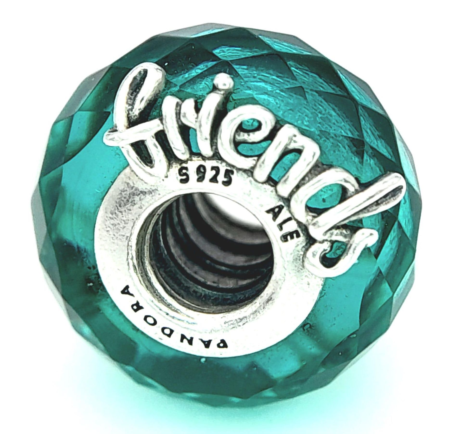 A Sterling Silver Pandora 'Always Friends' Murano Glass Charm. 1.3cm diameter, 2.8g total weight.