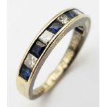 An 18K Gold Diamond and Sapphire Half-Eternity Ring. Size K. 3.1g total weight. Ref: 016637