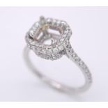 AN 18K WHITE GOLD DIAMOND SET HALO MOUNT RING - WITH DIAMOND SET SHOULDERS AND FULL DIAMOND SET