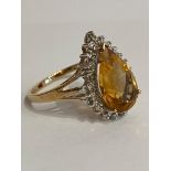 Stunning 9 carat GOLD and ORANGE TOURMALINE RING. Having a large ( 3 carat ) Pear Cut Orange