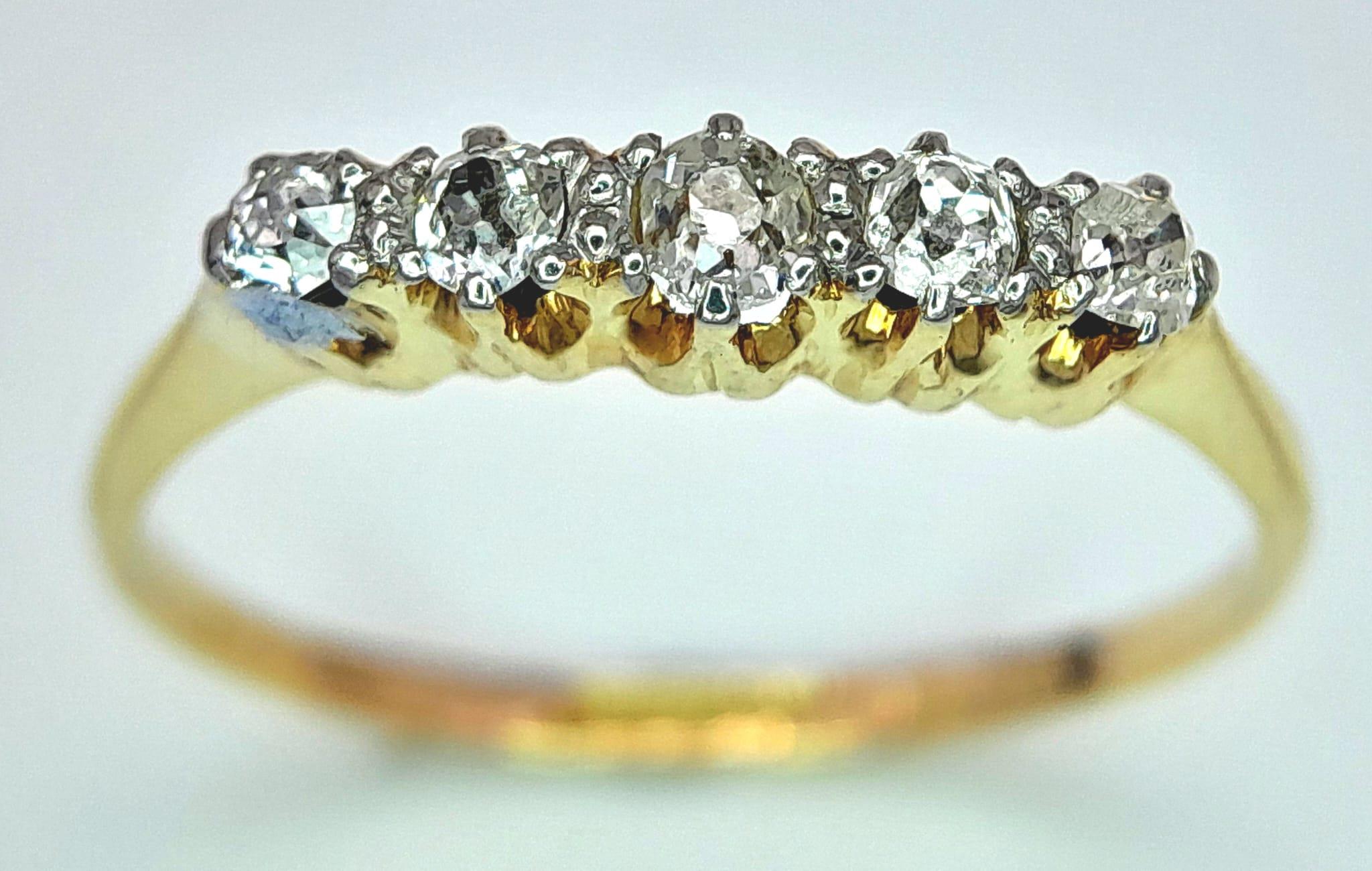 An 18K Yellow Gold and Platinum Vintage Old Cut Diamond 5 Stone Ring. 0.20ctw, Size M, 1.5g total