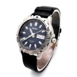 A Vintage Seiko Quartz Gents Watch. Black leather strap. Stainless steel case - 38mm. Blue dial with