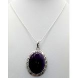 An Amethyst Oval Pendant on a 925 Silver Necklace. 5cm and 42cm.