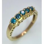A 9K Yellow Gold Five Stone Topaz Ring. Size L. 2.12g total weight.