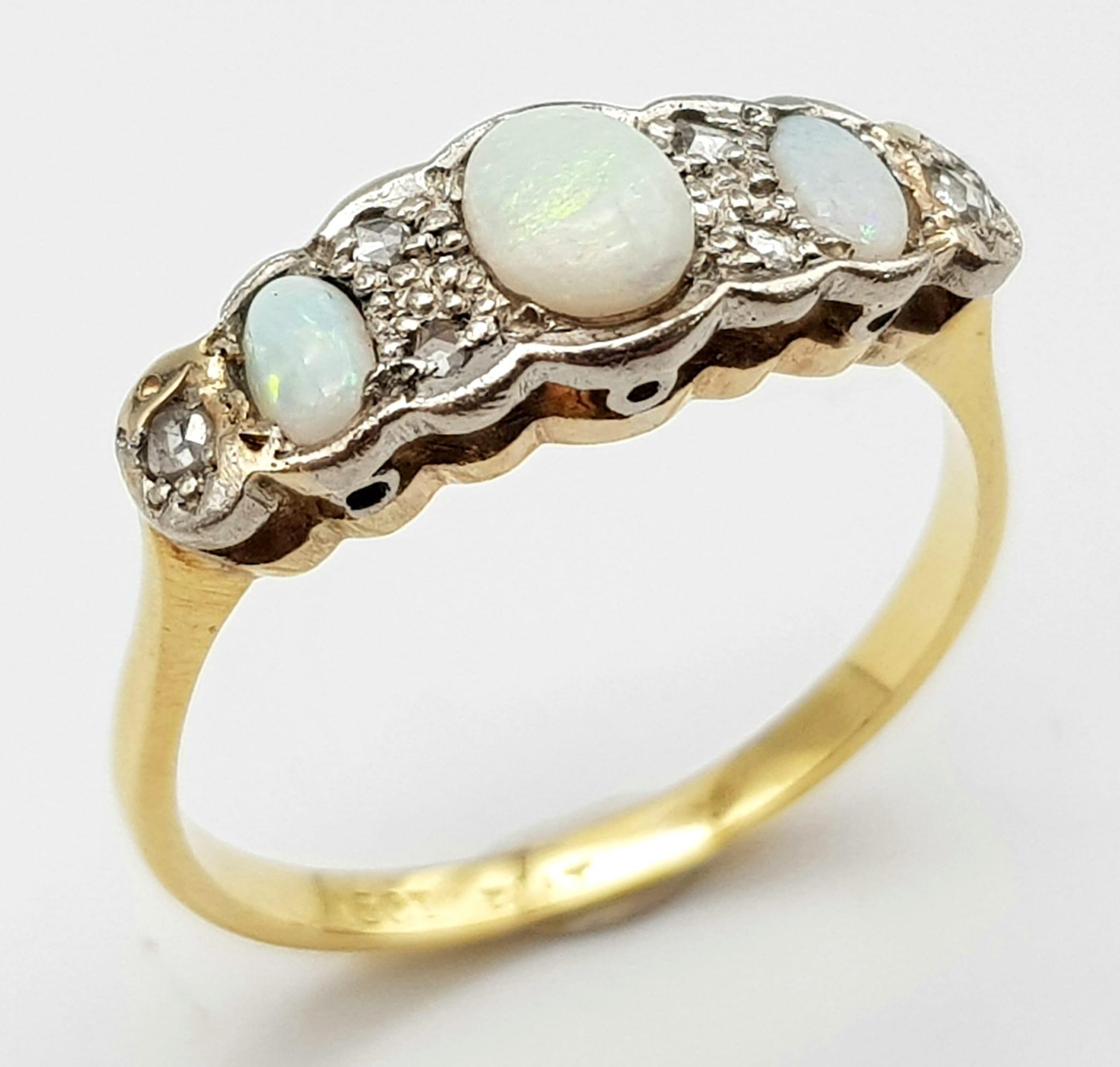 An Antique Opal and Diamond 18K Yellow Gold Ring. Three opals with diamond accents. Size O. 2.72g - Image 2 of 5