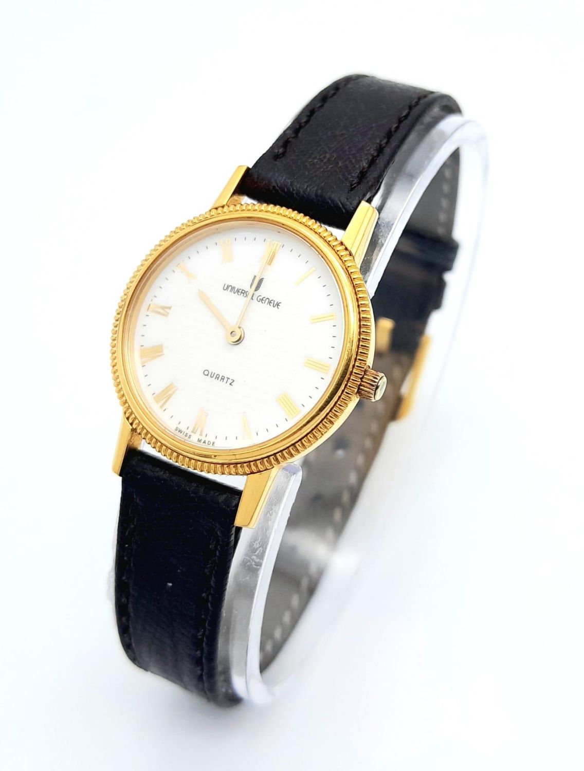 A Gold Plated Universal Quartz Ladies Watch. Black leather strap. Gold plated case - 23mm. White - Image 3 of 12