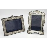 Two Sterling Silver Picture Frames - London and Birmingham hallmarks. 19 x 13cm and 17 x 15cm.