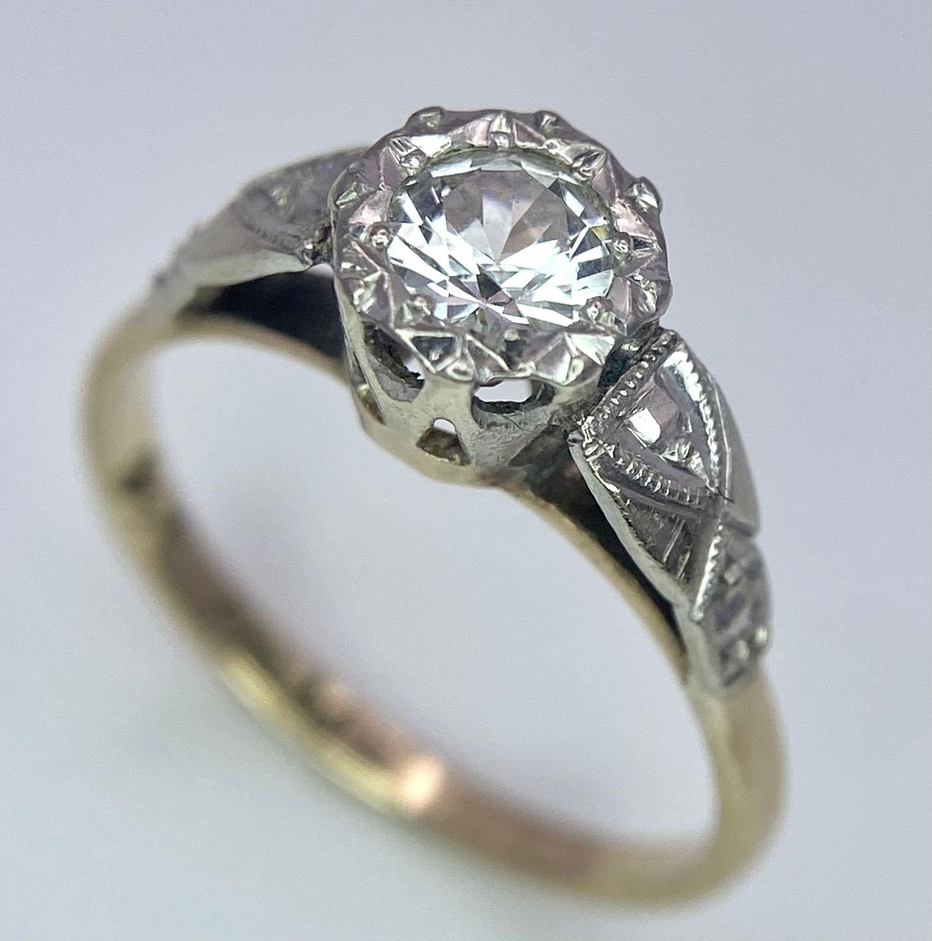 9k yellow gold CZ stone solitaire ring with detailed shoulders, equivalent to 0.25ct stone, 1.8g,