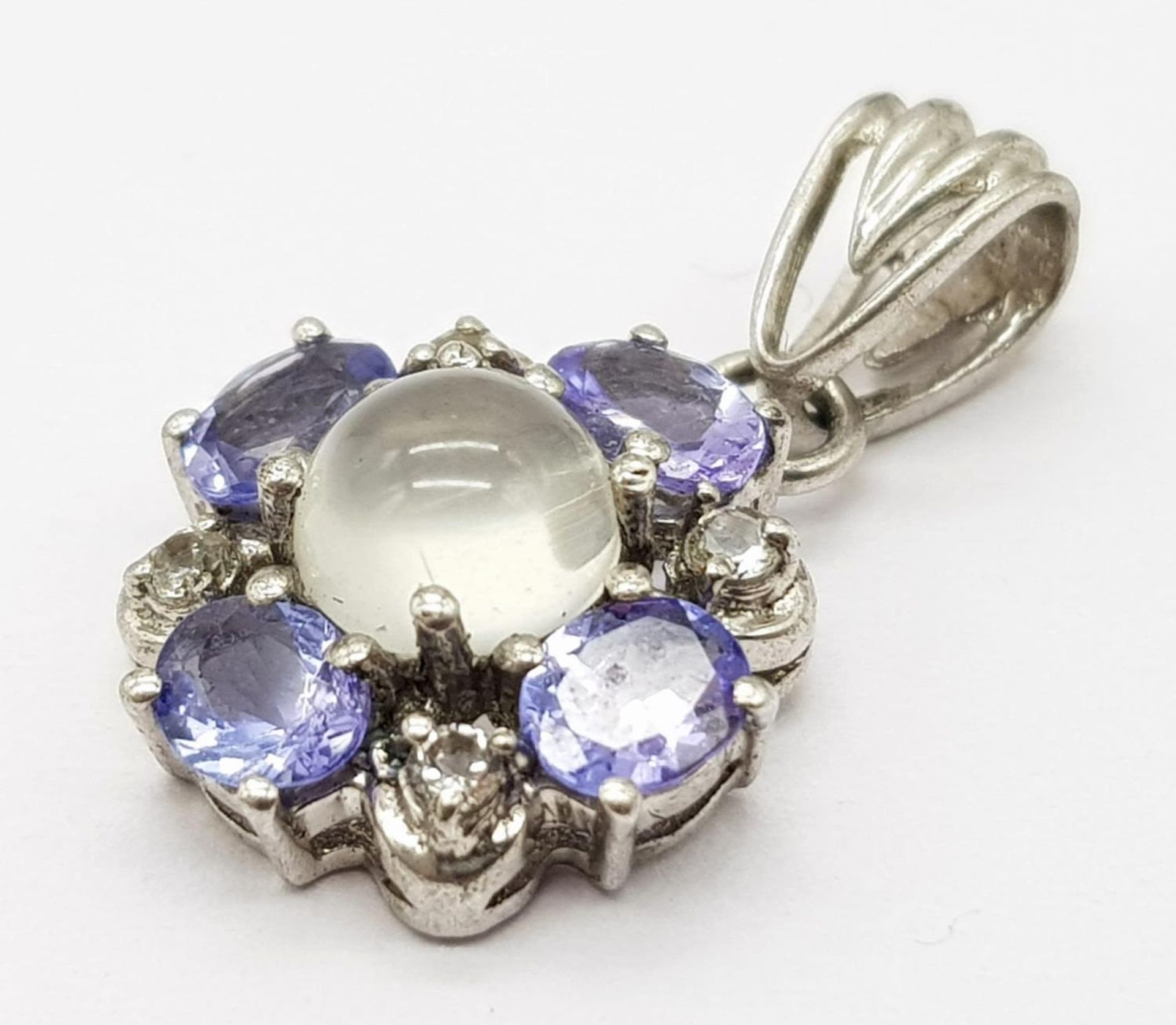 A Moonstone and Tanzanite Cluster Silver Pendant. 22mm.