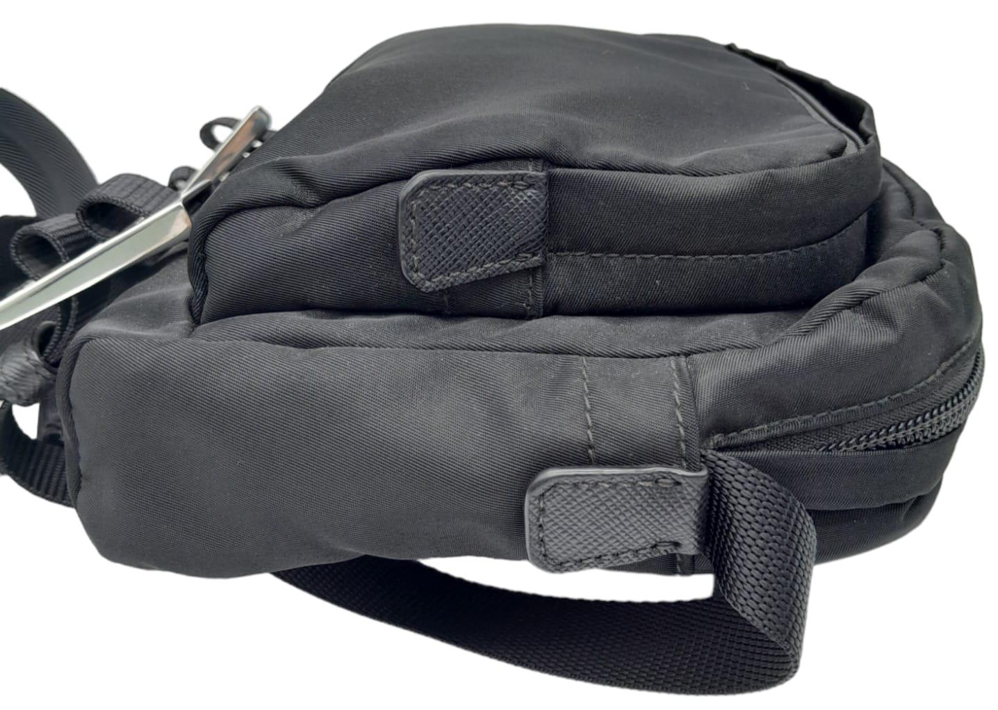 A Prada Black 'Tessuto Montagna' Crossbody Bag. Textile exterior with silver-toned hardware, a - Image 4 of 11