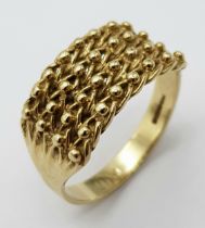 A Vintage 9K Yellow Gold Keeper Ring. Size U. 4.2g