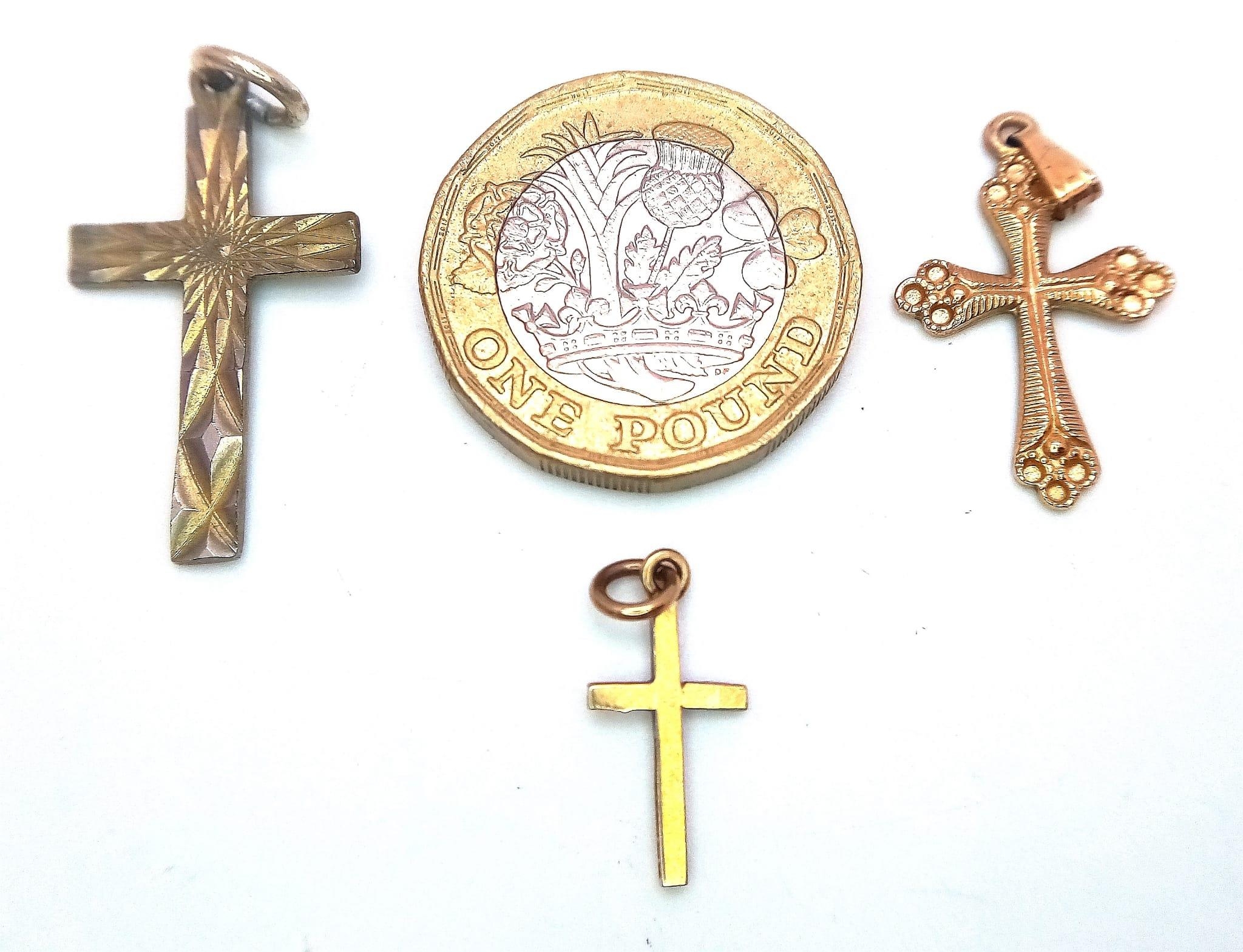 Three Different Size 9K Yellow Gold Cross Pendants. 30mm x 1.5mm largest pendant. 2.22g total - Image 2 of 4