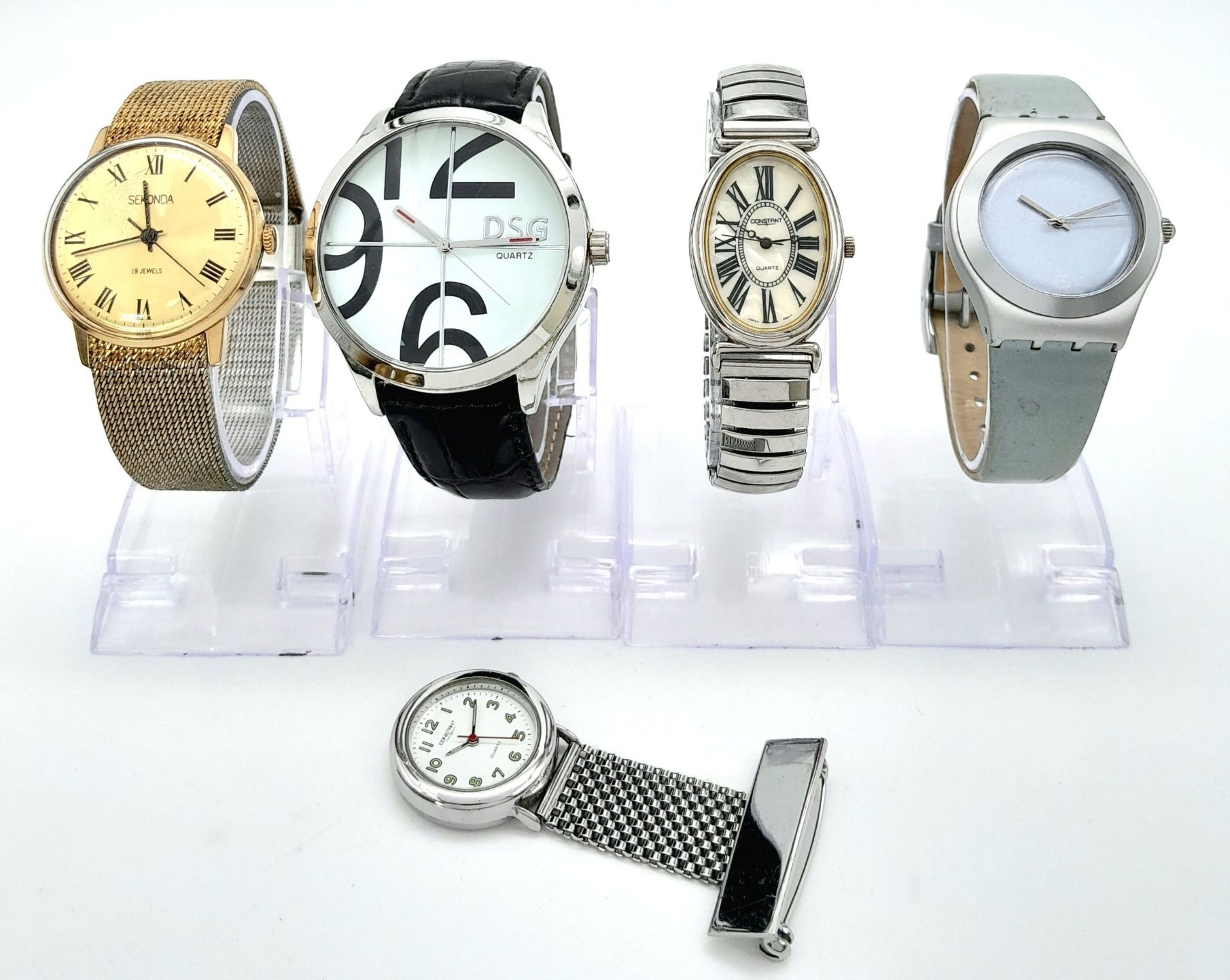 A Parcel of Five Vintage Watches. Comprising: 1) A Ladies Roman Numeral Oval Case Quartz Watch by