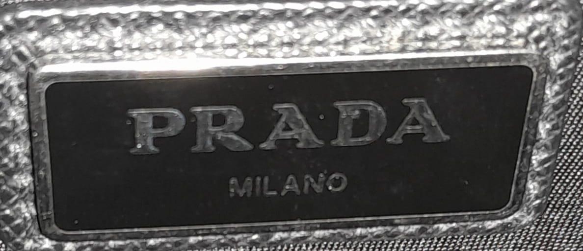 A Prada Black 'Tessuto Montagna' Crossbody Bag. Textile exterior with silver-toned hardware, a - Image 9 of 11