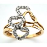 A 9K YELLOW GOLD DIAMOND SET HEARTS RING. Size N, 2.4g total weight. Ref: 7423