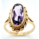 A 9K YELLOW GOLD AMETHYST SET VINTAGE RING. Size P, 3.8g total weight. Ref: SC 8038