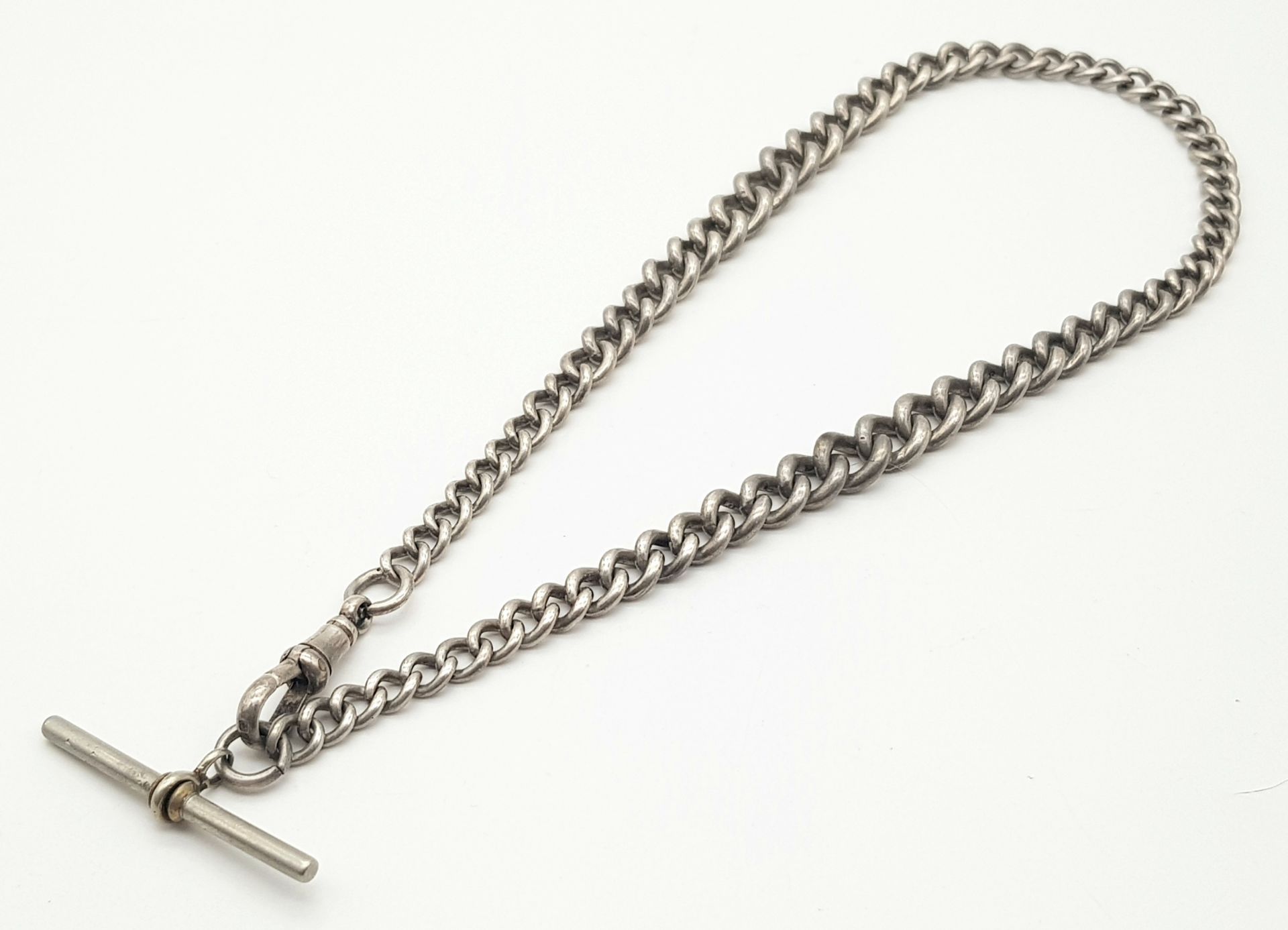 A Vintage/Antique Sterling Silver Albert Chain - Faded Hallmarks. 36cm length. 42g