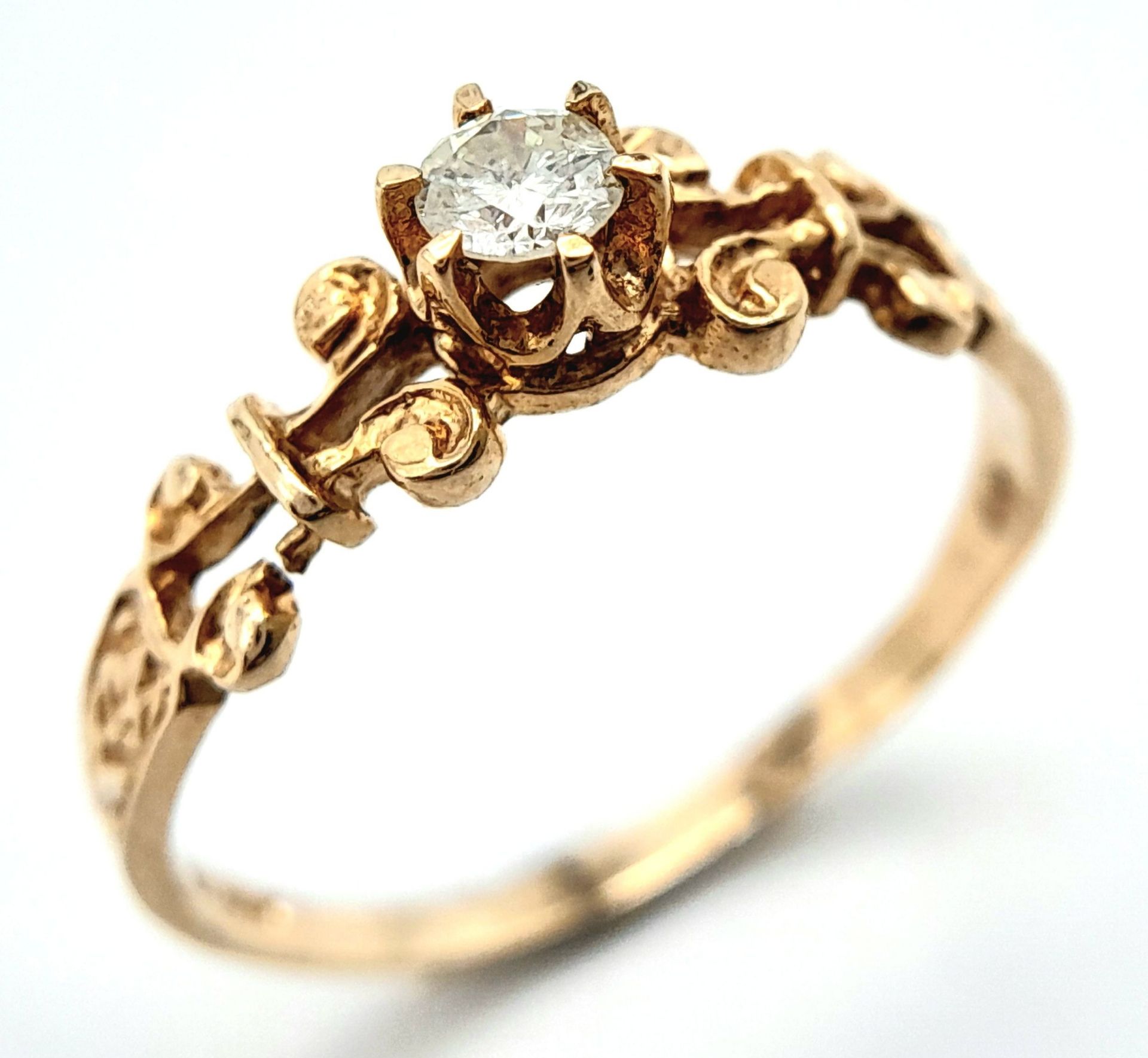 A 9K YELLOW GOLD FANCY DIAMOND SOLITAIRE RING. 0.15CT. 1.3G. SIZE N - Image 4 of 6