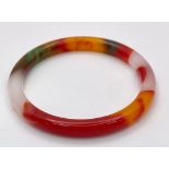 A Swirling Multi-Coloured Decorative Thin Jade Bangle. 6cm inner diameter.