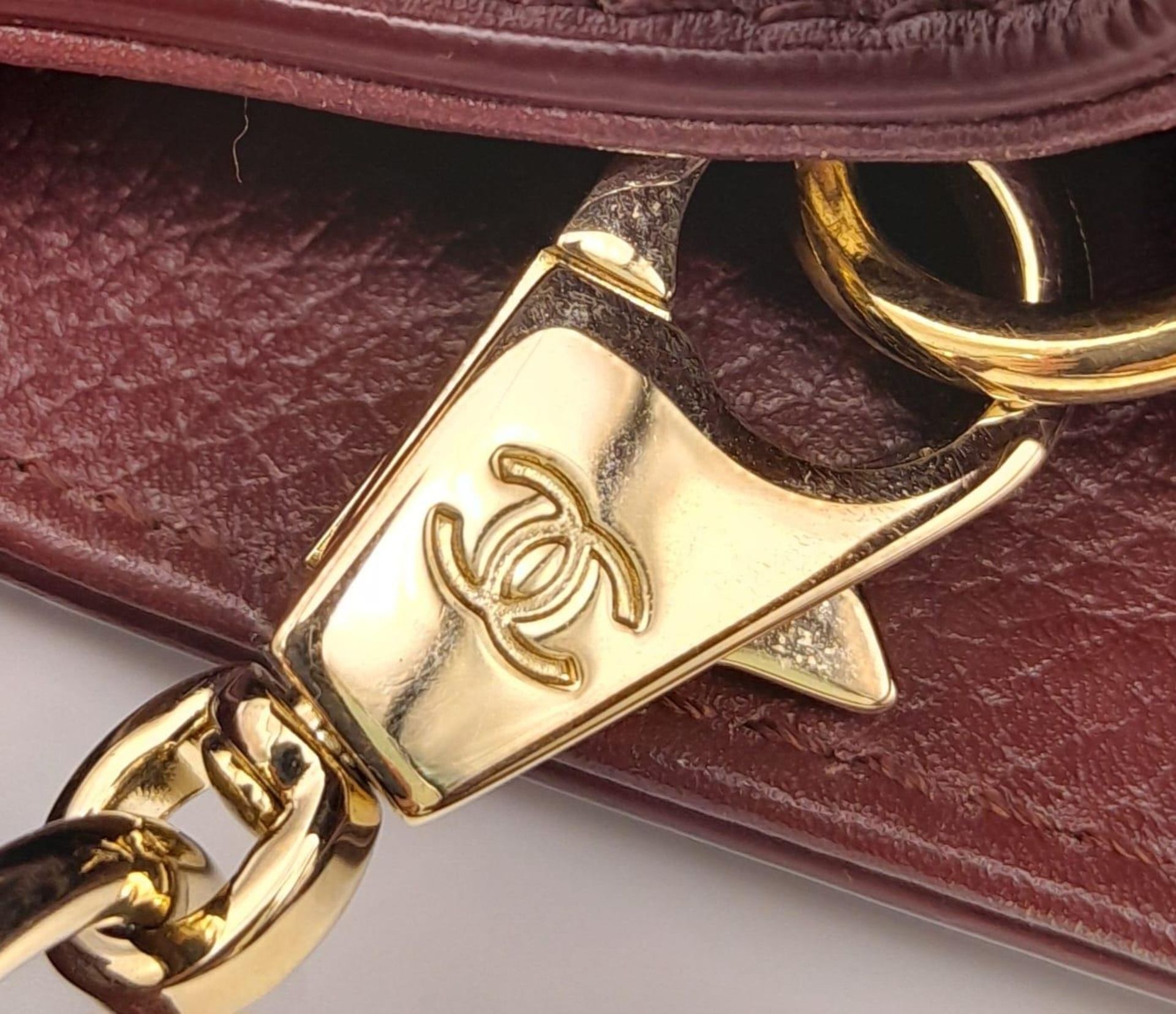 A Chanel Neo Executive Leather Tote Bag. Burgundy leather exterior with gold tone hardware and two - Image 8 of 11